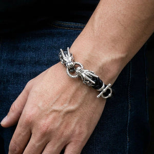 Dual Dragon Head Sterling Silver Leather Bracelet, worn on the wrist