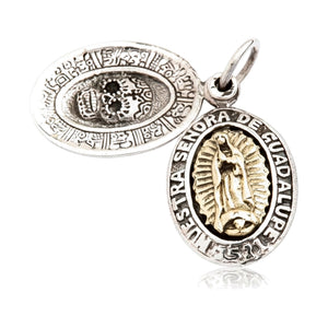 Silver sugar skull medal with its forehead cross and engraved border