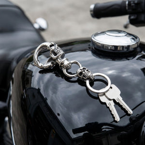 Double Skull Sterling Silver Keychain, with keys on motorcycle