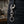 Double Skull Sterling Silver Keychain, hanging from a denim belt loop