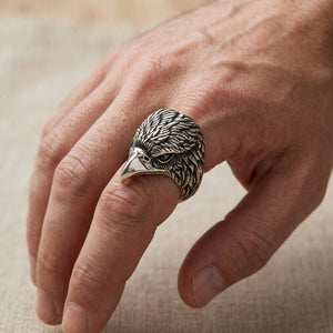 Eagle head silver statement ring worn on a hand