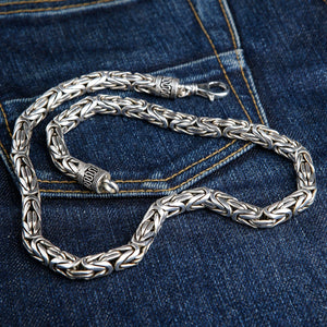 8mm Byzantine Sterling Silver Heavy Chain Necklace shown in diagonal links on denim view.