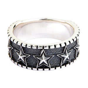 Embossed Star Sterling Silver Band Ring. Embossed stars front.