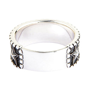 Embossed Star Sterling Silver Band Ring. Plain polished back.