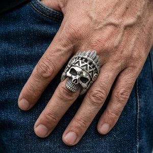Feather headdress skull silver ring worn on a hand