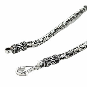 5mm Byzantine Sterling Silver Chain Necklace shown in lobster scroll cap detail view.