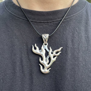 Flame Guitar Pick Holder in Sterling Silver, worn at the neckline