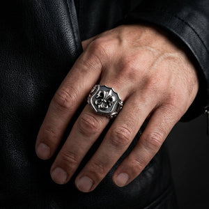 Fleur-de-Lis Shield Sterling Silver Ring worn on a man's hand