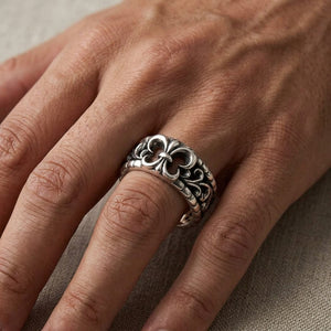 Fleur-de-Lis Sterling Silver Band Ring worn on a hand
