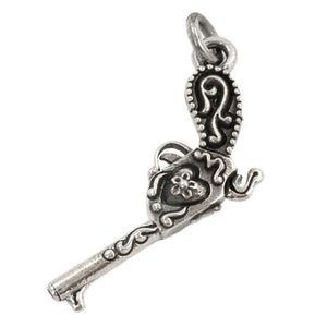Flintlock Pistol and Heart Sterling Silver Pendant shown in flower heart grip angle view.