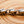 Togglearmband i 925 sterlingsilver med blomlänkar, närbild av upprepade bladlänkar