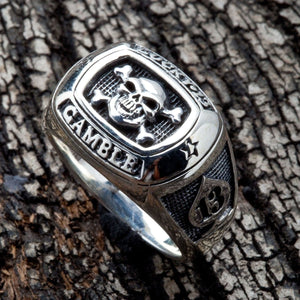 Gamble Skull and Crossbones Silver Signet Ring. Signet oblique angle.