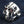 Garnet-Eye Fang Devil Sterling Silver Ring, horned skull left angle