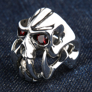 Garnet-Eye Fang Devil Sterling Silver Ring, horned skull left angle