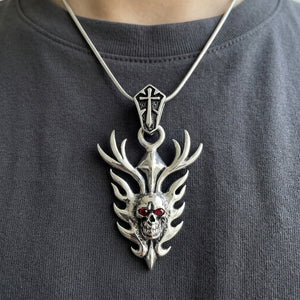 Garnet Flame Skull Sterling Silver Pendant, worn chest detail