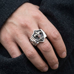 Fleur-de-Lis-Schildring aus 925er Sterlingsilber mit Granat