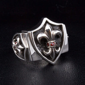 Garnet Fleur-de-Lis Shield Sterling Silver Ring, three-quarter shield and red stone view