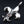Fleur-de-Lis-Anhänger aus Sterlingsilber mit Granat, Ansicht der Lilie und der roten Steine schräg von links