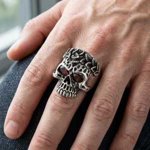 Garnet Eye Leaf Crown Sterling Silver Skull Ring, worn on hand