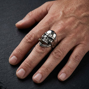 Gold-Cigar Skull Sterling Silver Biker Ring worn at a natural scale on a man's hand
