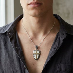 Gold Cross Shield Sterling Silver Pendant, worn on the neck with collarbones, shoulders and upper chest visible