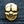 Anillo de calavera de latón bañado en oro de 14k, cara de calavera bañada en oro y dientes de frente sobre mezclilla