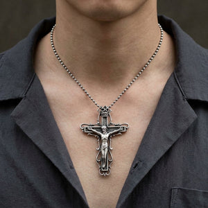 Gothic Cathedral Crucifix Sterling Silver Pendant, worn on a neutral styling chain from chin down with collarbones, shoulders and upper chest visible; chain not included