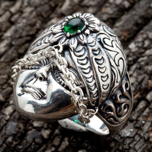 Green CZ Tribal Face Sterling Silver Ring. Face chain opposite angle.