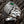 Green CZ Tribal Face Sterling Silver Ring. Tribal face oblique.