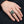 Green Stone Tiger and Dragon Sterling Silver Ring worn on an adult hand