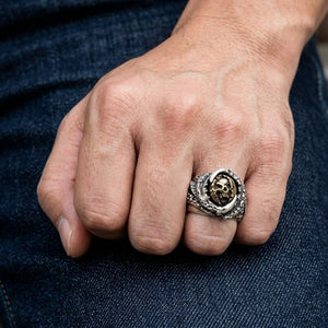 Grim Reaper claw sterling silver ring with gold skull worn on a closed fist