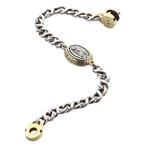 Guadalupe Silver and Brass Medallion Bracelet showing the open curb chain and medallion from the opposite angle.