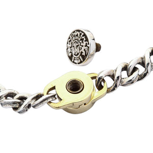 Guadalupe Silver and Brass Medallion Bracelet showing the screw thread and brass receiving plate closely.