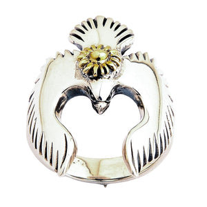 Handcrafted sterling silver bird jewelry, this ring shows detailed feather carvings and a polished finish.
