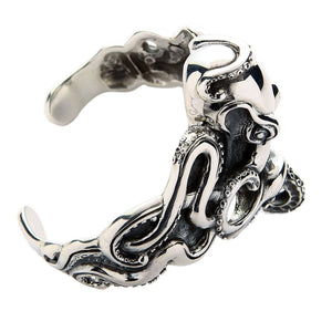 Heavy Kraken Octopus Sterling Silver Cuff, a top view of the sterling silver kraken octopus cuff with its polished head and