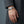 Heavy sterling silver Cuban link bracelet worn with a charcoal coat