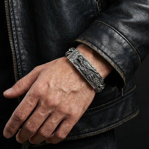 Heavy sterling silver dragon id bracelet alternate worn view for scale