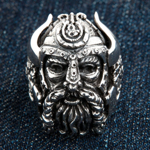 Horned Warrior and Shield Sterling Silver Ring shown in warrior face on denim view.