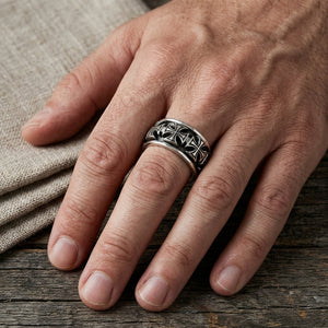Iron Cross Sterling Silver Spinner Ring worn on a hand