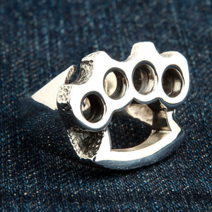 Knuckle Duster Sterling Silver Ring, ring on denim angle