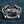 Knuckle Duster Sterling Silver Ring, ring on denim front
