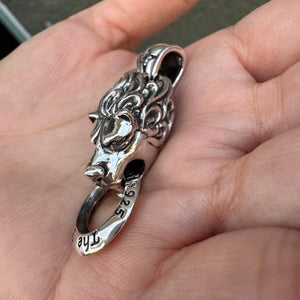Lion Door-Knocker Sterling Silver Pendant shown in lion head side view.