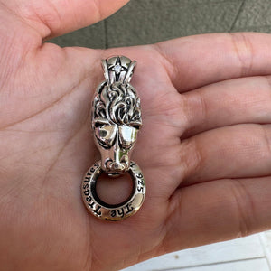 Lion Door-Knocker Sterling Silver Pendant shown in lion mouth ring front view.