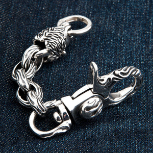 Red-Eye Lion Head Sterling Silver Keychain showing rear mane and clasp detail with the chain curved.