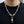 Lion and Skull Sterling Silver Chain Necklace, worn at the neckline