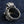 Mjolnir Charm and Scale Sterling Silver Ring shown in rear loop profile view.