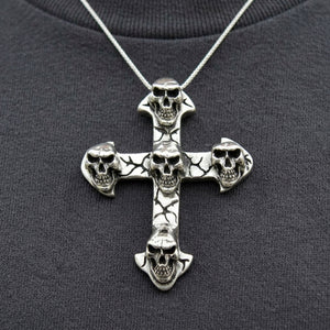 Multi Skull Gothic Cross Sterling Silver Pendant, worn chest detail