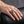 Mystic Quartz Union Jack silver ring shown from the front on a hand at a smaller scale