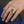 Natural Green Peridot Gold-Plated Silver Ring, worn on one middle finger in a natural hand close-up