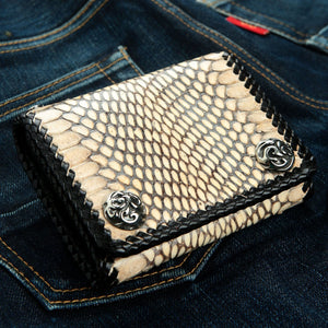 Natural Snakeskin Trifold Biker Wallet showing natural cream and black scales with two flame snaps at an angle.